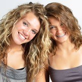 Two smiling young women