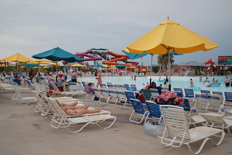 Community members relaxing by pool