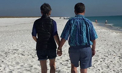 Dr. Hart and wife on beach