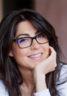 a woman wearing braces near Joshua