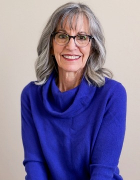 Headshot of Christy