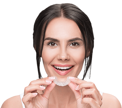 Woman holding aligner tray