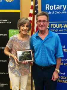 Dr. Hart and his wife holding Rotary Club Award