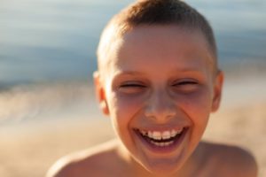 Boy smiling with braces