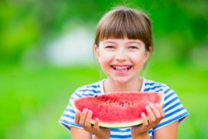 child with braces