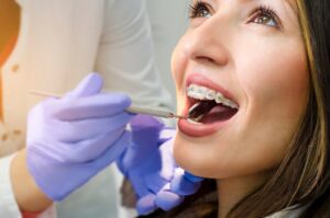 Woman with braces at the dentist.